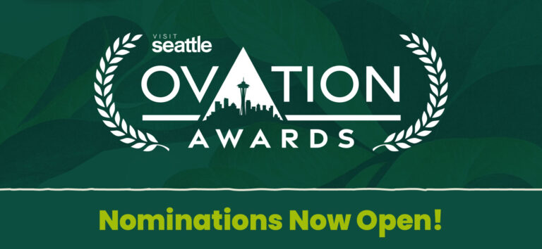 Graphic for the Visit Seattle Ovation Awards, featuring a city skyline inside the letter "A" and laurel leaves. Text reads "Nominations Now Open!" on a green background with leaf patterns.