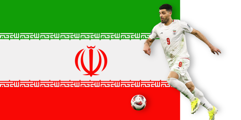 A soccer player in a white Iran national team uniform with number 9 is kicking a ball. The background features the green, white, and red flag of Iran.
