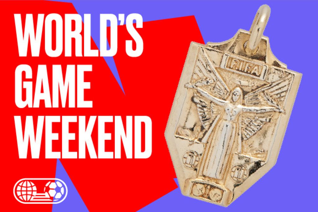 A gold FIFA medal with an angel figure is shown next to bold white text reading "WORLD'S GAME WEEKEND" on a red and purple background. Soccer and globe icons appear in the bottom left corner.