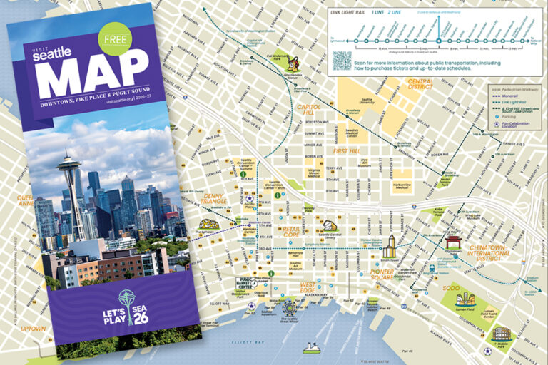 A Seattle city map features a guide with a skyline photo, public transit routes, key neighborhoods, landmarks, parks, and a light rail diagram. The map highlights downtown, Pike Place, Capitol Hill, and other central areas.