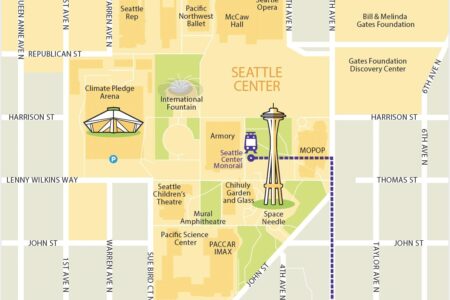 Colorful map of Seattle Center showing landmarks like the Space Needle, Climate Pledge Arena, museums, theaters, parks, and nearby streets including Mercer St, 5th Ave N, Denny Way, and Harrison St.