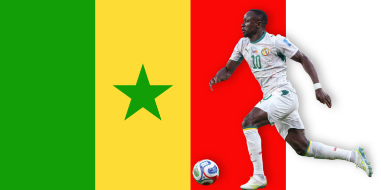 A soccer player in a white Senegal jersey runs with a ball against a background of the Senegal flag, which features vertical green, yellow, and red stripes with a green star in the center.