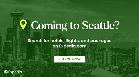 Expedia advertisement featuring the Seattle skyline, with text reading “Coming to Seattle? Search for hotels, flights, and packages on Expedia.com” and a “Search Now” button.